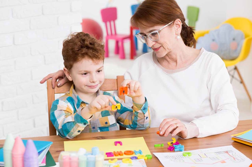 Governess teaching child.